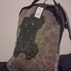Black acid wash Puma x XO Backpack